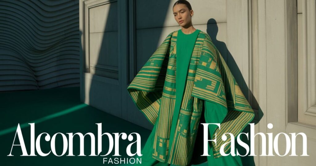 Alcombra Fashion model wearing a tailored beige coat with clean minimalist lines.