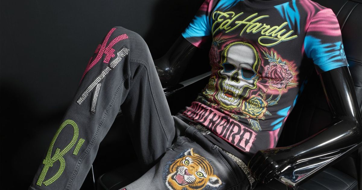 Ed Hardy set featuring a vibrant zip-up hoodie and graphic denim with signature tattoo-style prints.